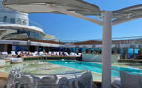 The pool deck on Oceania's Vista has a large tanning ledge where guests can walk, sit or sunbathe.