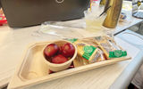 Food and beverage service in a premium class car onboard a Brightline train from West Palm Beach to Miami.