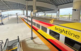 A Brightline train at the Brightline Orlando station, located at Orlando Airport.