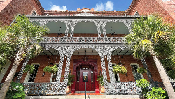 Wrought iron dominates the entrance of the Hotel Saint Vincent in New Orleans. Wrought iron dominates the entrance of the Hotel Saint Vincent in New Orleans.