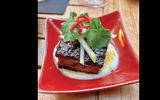 Slow cooked pork belly served at Galley, the resident restaurant of the Hilton West Palm Beach.