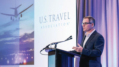 U.S. Travel CEO Geoff Freeman speaking at IPW 2023 in San Antonio on May 23.