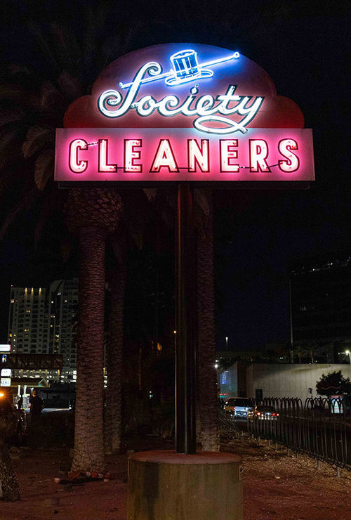 The Society Cleaners sign was one of seven vintage neon signs already in place on Las Vegas Boulevard. The Society Cleaners sign was one of seven vintage neon signs already in place on Las Vegas Boulevard.