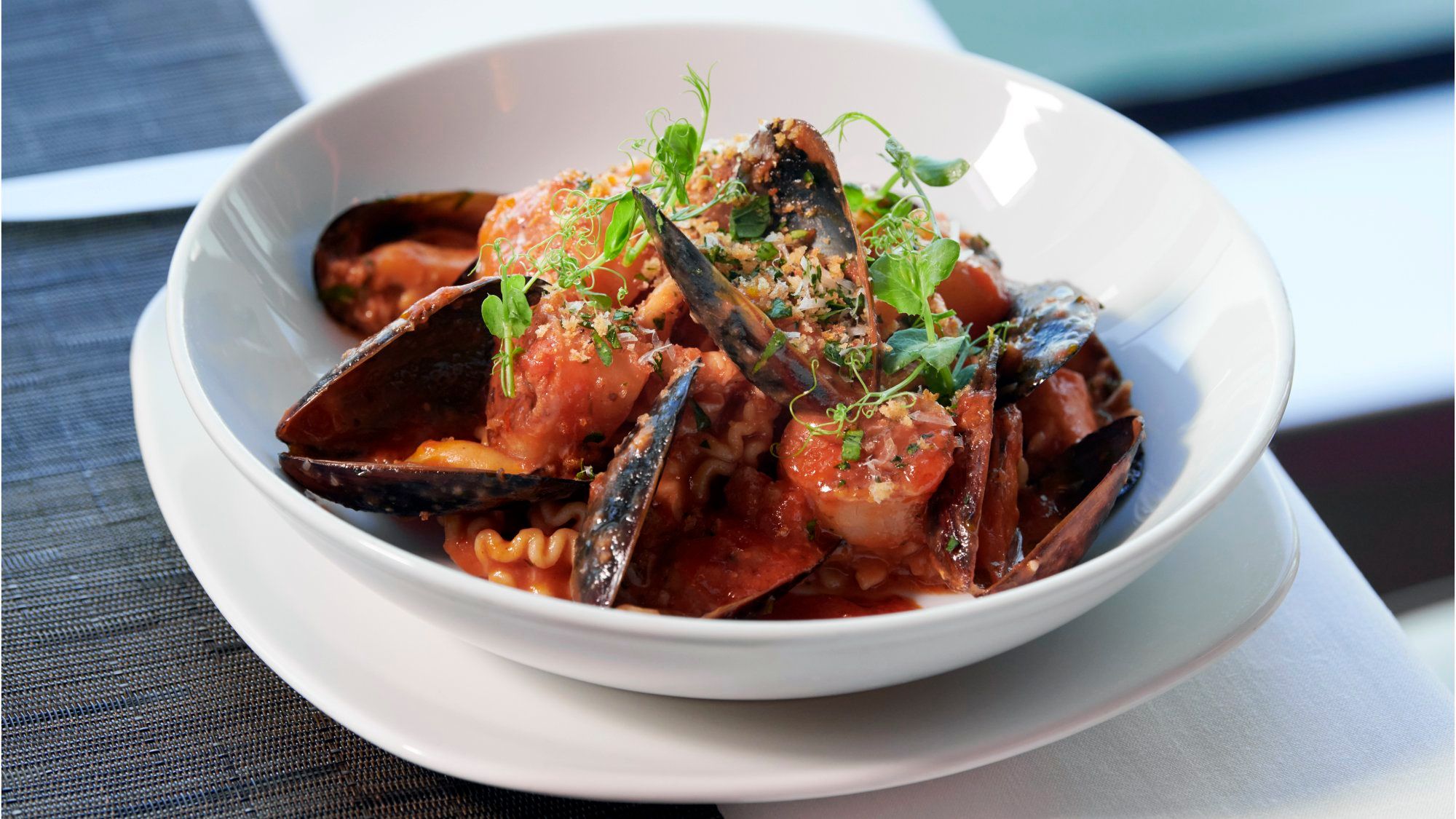 Trenette pasta with mussels, scallops and calamari in a seafood tomato reduction.