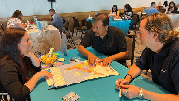 Cali Stein, of Four Hundred, at her table during GTM appointment sessions with Abhijit Das Gupta and Shawn Rettstatt of Indian Holiday.