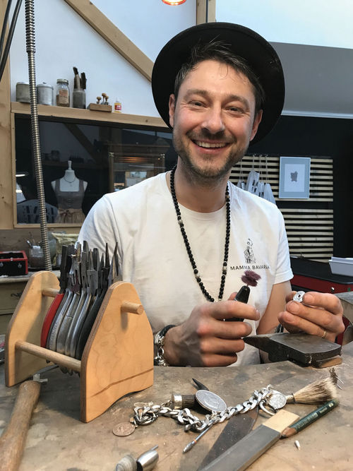 Florian Blickenberger, a barefoot goldsmith and designer with a shop in Riedering. Florian Blickenberger, a barefoot goldsmith and designer with a shop in Riedering.