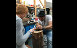 Vicky Smith, left, England-based writer and photographer, works with Florian Blickenberger on a silver pendant.