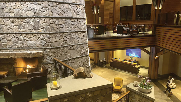 The property's centerpiece is a three-story stone column that is surrounded by several seating areas on different levels with plenty of fireplaces and cozy sofas in what is aptly called the Living Room The property's centerpiece is a three-story stone column that is surrounded by several seating areas on different levels with plenty of fireplaces and cozy sofas in what is aptly called the Living Room