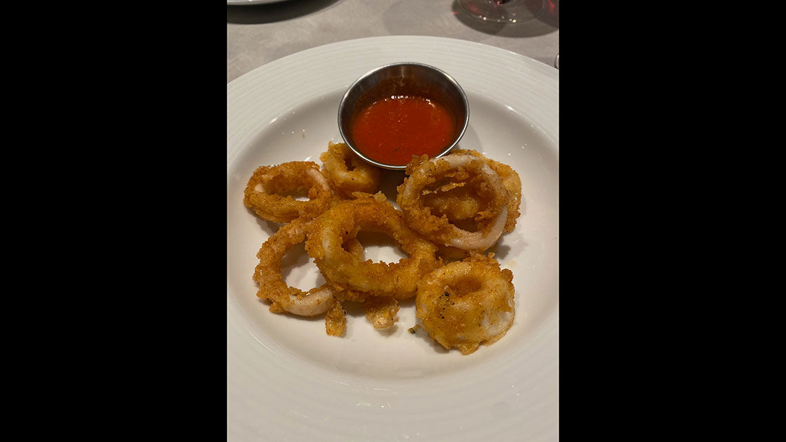 Calamari fritti served with a zesty tomato sauce at the Canal Grande restaurant on the Carnival Venezia.