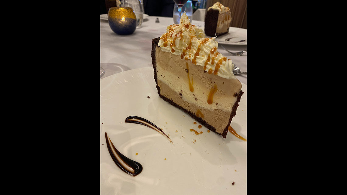 The mile-high gelato pie at Il Viaggio restaurant on the Carnival Venezia included layers of salted caramel, toasted coconut and mocha gelatos.