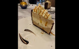 The mile-high gelato pie at Il Viaggio restaurant on the Carnival Venezia included layers of salted caramel, toasted coconut and mocha gelatos.