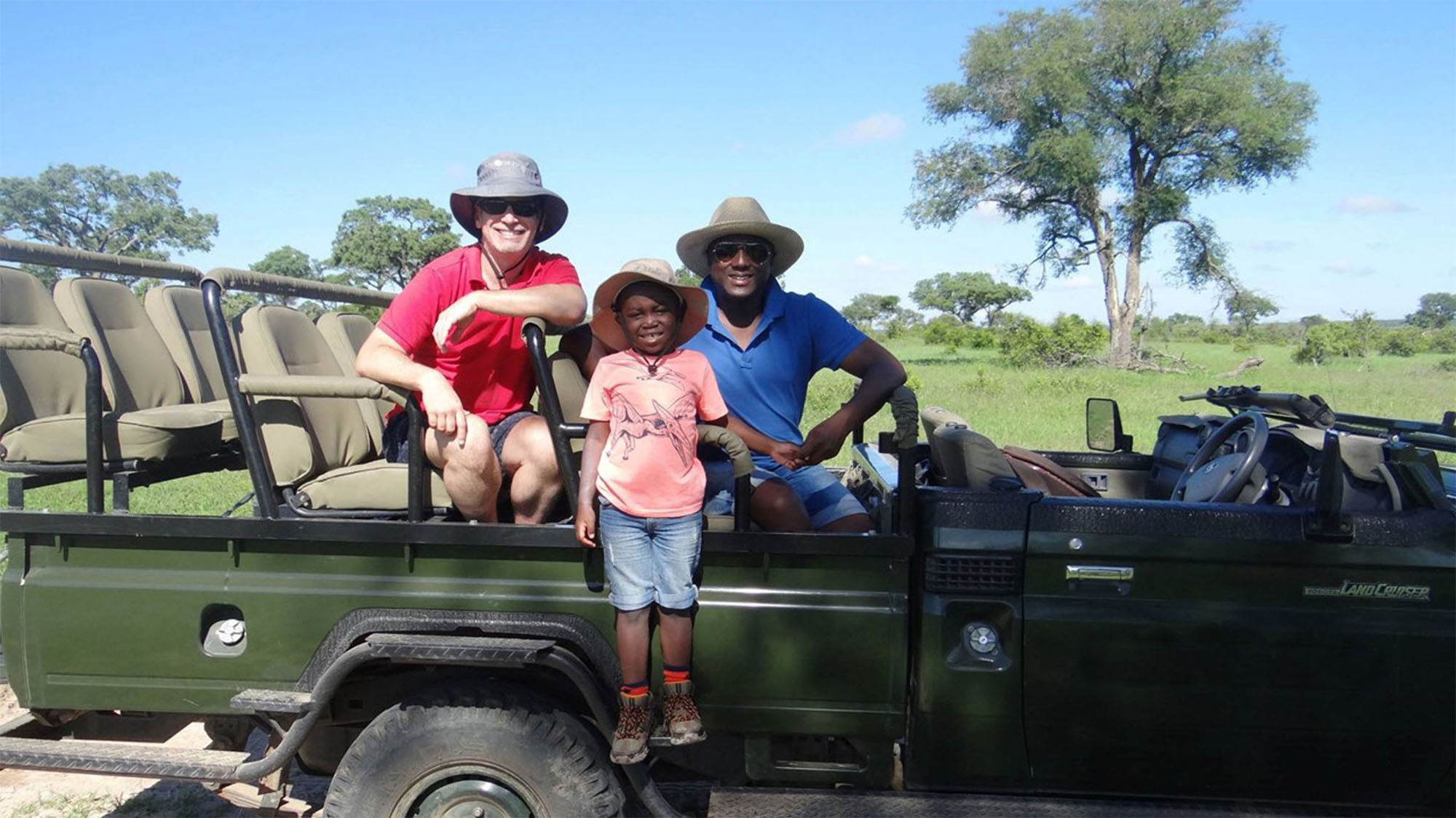 Sherwin Banda, president of African Travel Inc., and his family on safari.