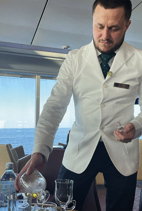 Bar manager Kim Seach serves cocktails in the 1893 Bar.