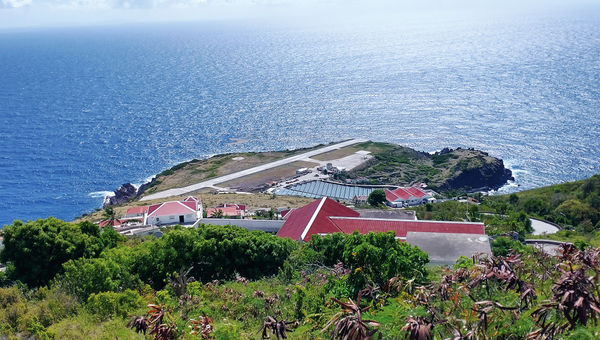 The island's Juancho E. Yrausquin Airport has a short runway that ends in a cliff on each side.