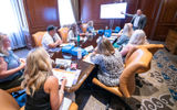 Scott Fujinaga, Las Vegas Visitors and Convention Authority, gives a presentation to a small group of advisors during GTM West's signature Boardrooms.