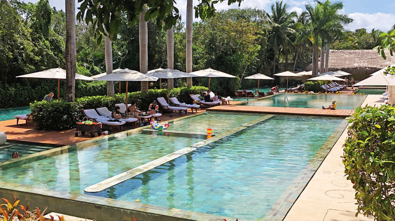 A family-friendly pool area at the Grand Velas Riviera Maya's wellness-focused, 254-room Zen Grand section.