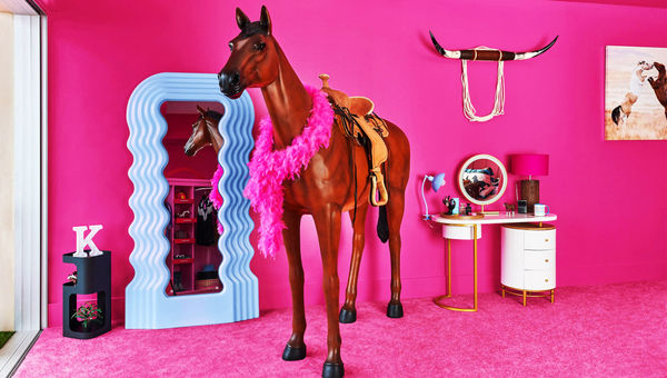 Ken's bedroom at the Barbie’s Malibu DreamHouse is outfitted with a life-size toy horse. Ken's bedroom at the Barbie’s Malibu DreamHouse is outfitted with a life-size toy horse.