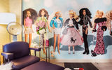 A close up of a Barbie mural in a "hyper-themed" Barbie room at The Curtis hotel in Denver.