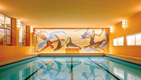 Vestkantbadet's art deco swimming pool is notable for its mural by Per Krohg. Vestkantbadet's art deco swimming pool is notable for its mural by Per Krohg.