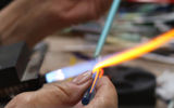 Jobean Chambers makes glass art in her Jobean Glass Art studio in Booby Hill, Saba.