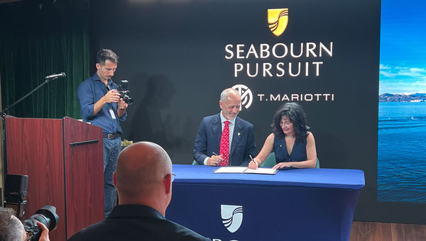 T. Mariotti managing director Marco Giglione and Seabourn president Natalya Leahy complete the handover process for the Seabourn Pursuit.