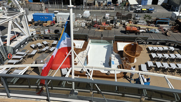 The infinity pool and aft sun deck on the day of the ship's delivery from the T. Mariotti yard.