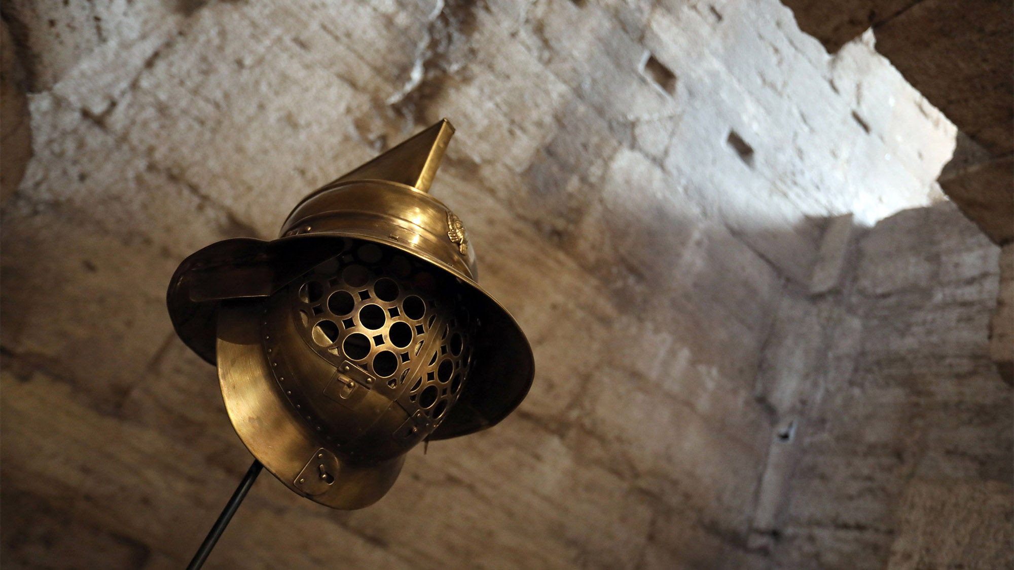 Gladiator's helmet located in the newly renovated Underground Colosseum exhibit in Rome.