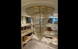 The chandelier in the three-deck main dining room on Icon of the Seas.