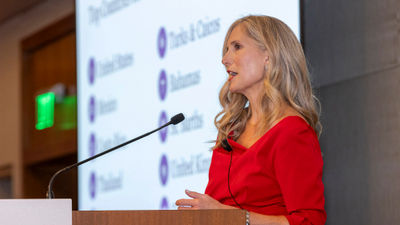 Virtuoso vice president of global public relations Misty Belles speaking at Virtuoso Travel Week.