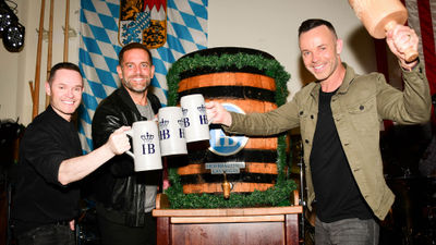 Members of the vocal group Human Nature hoist their steins at the 2022 Oktoberfest at Hofbrauhaus Las Vegas.