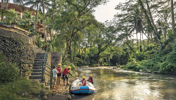 Guests arrive by private raft at the Four Seasons Resort Bali at Sayan in Ubud. Guests arrive by private raft at the Four Seasons Resort Bali at Sayan in Ubud.