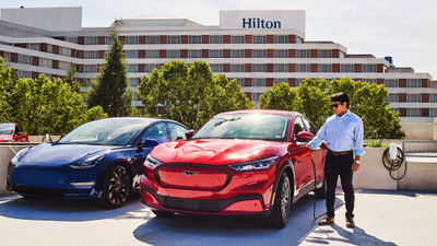 Hilton plans to install up to 20,000 Tesla Universal Wall Connector chargers at 2,000 hotels in the U.S., Canada and Mexico next year.