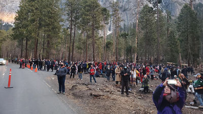 A large crowd of tourists at Yosemite National Park.