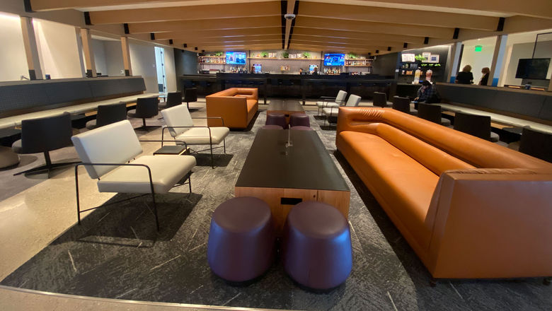 The bar on the United Club's second floor has a sophisticated feel and plenty of different seating options.