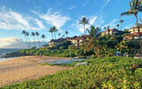 On the island just one month after Lahaina was ravaged by deadly wildfires, visitors were greeted with empatic thanks for coming back. Pictured, the beach at the Fairmont Kea Lani.