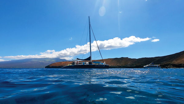 The Kai Kanani II catamaran moored off Molokini during the snorkeling tour. The Kai Kanani II catamaran moored off Molokini during the snorkeling tour.