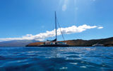 The Kai Kanani II catamaran moored off Molokini during the snorkeling tour.
