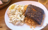 The fresh-catch plate at the Paia Fish Market, featuring blackened mahi mahi, Cajun rice and housemade coleslaw.