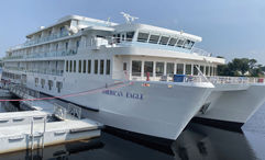 The coastal catamaran-style American Eagle sits docked on the Penobscot River in Bangor, Maine.