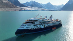 The Ocean Explorer ran aground in the Alpefjord in Northwest Greenland National Park on Sept. 11. It was pulled free by a fishing research ship Thursday.