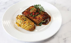 Carnival Cruise Line is introducing a vegan menu in its dining rooms fleetwide by the end of the year, with entrees including grilled tofu steak.