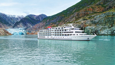 The American Constellation in Alaska. American Cruise Lines is operating cruisetours that take in a cruise through Glacier Bay National Parks, plus land visits to two other national parks.