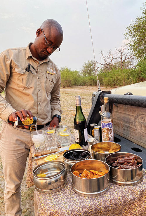Game ranger Dutch prepares sundowners. After handing us our gin and tonics, he would remind guests to take in the surroundings and listen to the sounds of the wilderness.