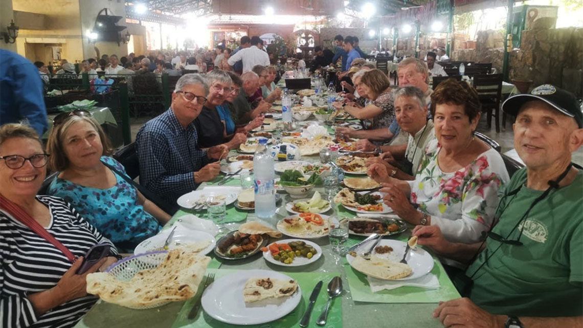 Travelers with Overseas Adventure Travel eat dinner in Amman, Jordan.