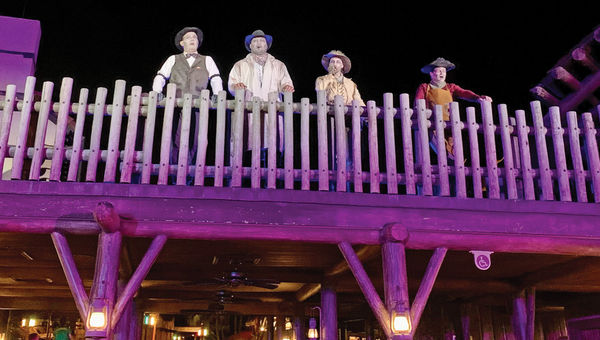The Cadaver Dans Barbershop Quartet entertains visitors in Frontierland.