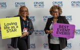 Advisors showed off at CruiseWorld with signs.