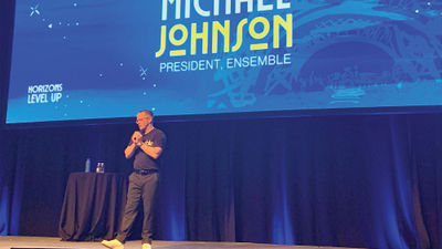 President Michael Johnson addresses travel advisors at Ensemble's Horizon event in Las Vegas.