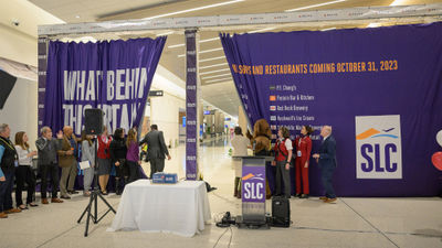 Execs open the curtain to the redeveloped section of Salt Lake City's airport, part of a multiyear, $5.2 billion redevelopment plan.