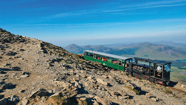 The Snowdonia Mountain Railway takes riders up Snowdon, the country's highest peak. The Snowdonia Mountain Railway takes riders up Snowdon, the country's highest peak.