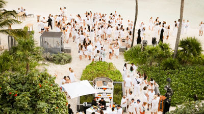 A white party on the beach during Embark Beyond's Cancun event.